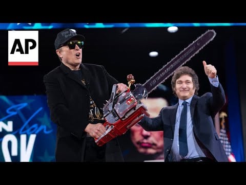 WATCH: Elon Musk waves chainsaw on stage at CPAC